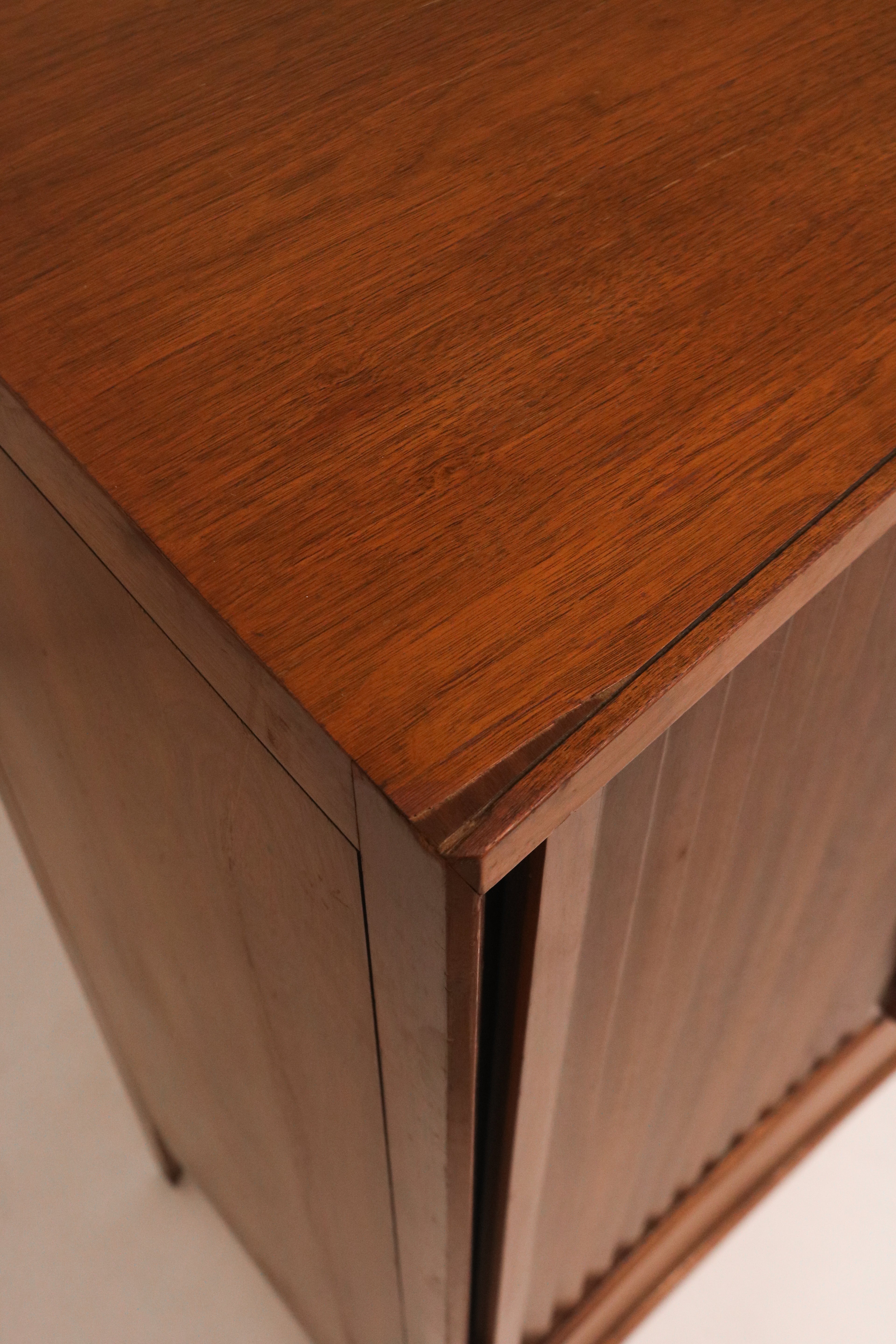 Macro shot of the rich walnut wood grain texture and color depth