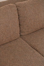 Macro view of the woven fabric texture pattern in a neutral tone