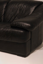 Close-up detail genuine leather armrest showing natural wrinkles and texture