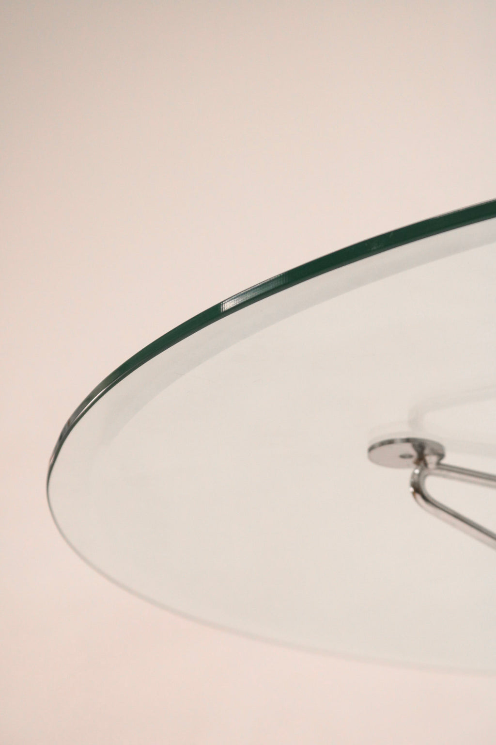 Close-up of the X-base steel leg design providing stability